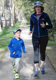 Dr. Kelly (R) and Alexander Scrimger participate in the AMA Youth Run Club