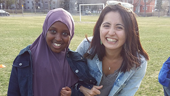 Dr. Finola Hackett (R) learned that collaborating with a community, with individuals and families directly, is a very rewarding approach to health promotion.