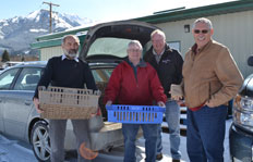 Left to right: Food Food Bank President Terry Grinevitch, Dr. Allan Garbutt, Food Bank Director Bruce Street, and Food Bank Treasurer Tom Head. (Joni MacFarlane photo)