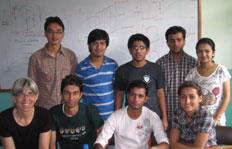Dr. Bibiana Cujec (bottom left), another member of Dr. Solez' campus group, with students at Patan Hospital